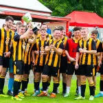 Largs Thistle with the John Grant Tournament trophy in 2022. Pre-season 2023-24 sees us play in this again.