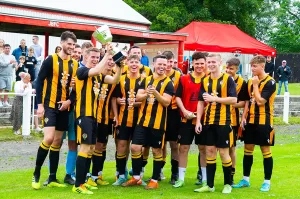 Largs Thistle with the John Grant Tournament trophy in 2022. Pre-season 2023-24 sees us play in this again.
